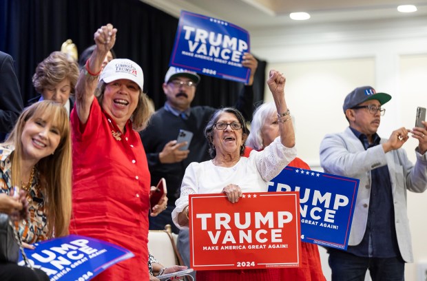 Supporters cheer before Republican presidential candidate and former President Donald Trump speaks during a roundtable discussion with local Latino leaders at Trump National Doral Miami on Oct. 22, 2024, in Doral, Florida. (Matias J. Ocner/Miami Herald)