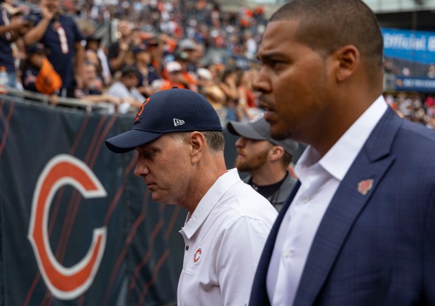 Bears coach Matt Eberflus and general manager Ryan Poles leave the field after a preseason game Aug. 13, 2022, at Soldier Field. (Brian Cassella/Chicago Tribune)