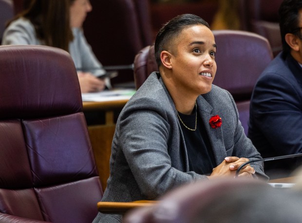 Ald. Jessie Fuentes, 26th, watches as the vote tallies appear on screen for The Northwest Side Housing Preservation Ordinance during a city council meeting in City Hall in Chicago on Sept. 18, 2024. (Tess Crowley/Chicago Tribune)