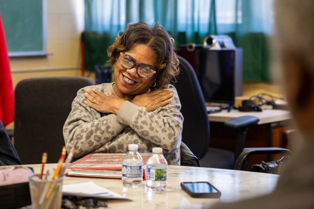 Debra Diggs signs during Bible study at Ephphatha Lutheran Church of the Deaf in Chicago on Oct. 16, 2024. (Tess Crowley/Chicago Tribune)