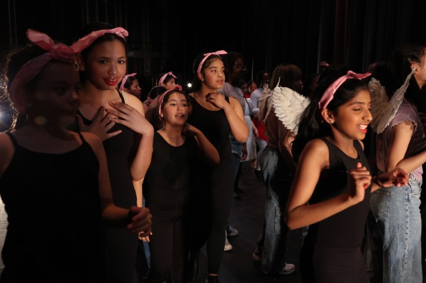 Dance students exit the stage after performing in the 61st annual Winter Arts Showcase at Jones College Prep on Saturday, Dec. 14, 2024. (John J. Kim/Chicago Tribune)