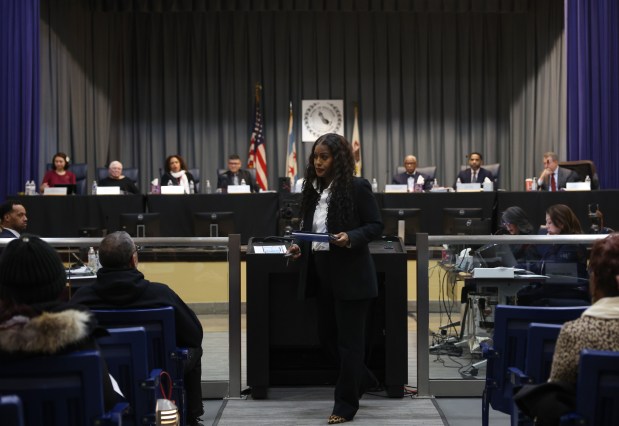 Chicago Teachers Union President Stacy Davis Gates finishes addressing the Board of Education during its monthly meeting at a Chicago Public Schools administrative office on Dec. 12, 2024. (John J. Kim/Chicago Tribune)