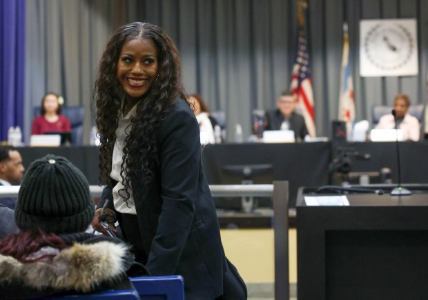 Chicago Teachers Union President Stacy Davis Gates acknowledges supporters after addressing the Board of Education during its monthly meeting at a Chicago Public Schools administrative office at 4655 S. Dearborn St., Dec. 12, 2024. (John J. Kim/Chicago Tribune)