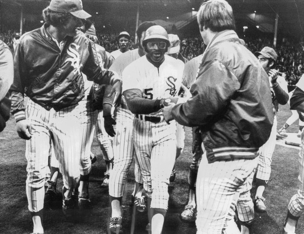 Teammates cluster around and congratulate Dick Allen after the White Sox slugger's home run ended a 21-inning marathon on May 28, 1973. (Ed Wagner Jr./Chicago Tribune)