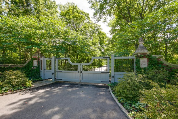 This four-bedroom, Tudor-style home at 499 W. Old Mill Road in Lake Forest borders a public prairie reserve. (Palo Dobrik Photography)