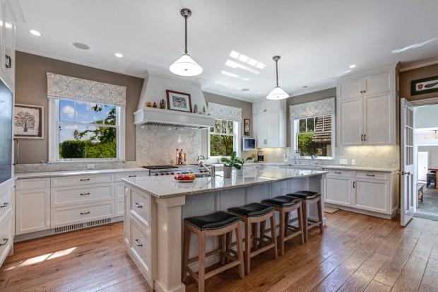 This four-bedroom, Tudor-style home at 499 W. Old Mill Road in Lake Forest borders a public prairie reserve. (Palo Dobrik Photography)