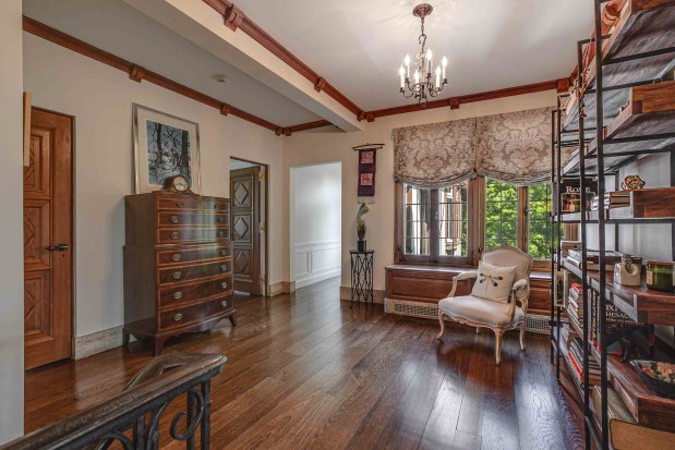 This four-bedroom, Tudor-style home at 499 W. Old Mill Road in Lake Forest borders a public prairie reserve. (Palo Dobrik Photography)