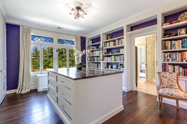 This four-bedroom, Tudor-style home at 499 W. Old Mill Road in Lake Forest borders a public prairie reserve. (Palo Dobrik Photography)