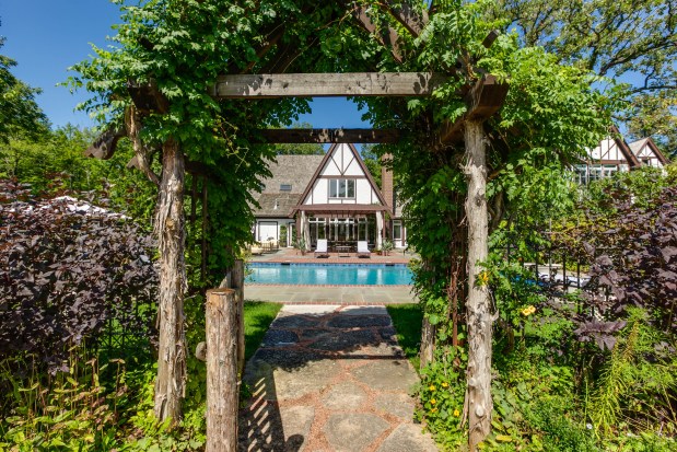 This four-bedroom, Tudor-style home at 499 W. Old Mill Road in Lake Forest borders a public prairie reserve. (Palo Dobrik Photography)