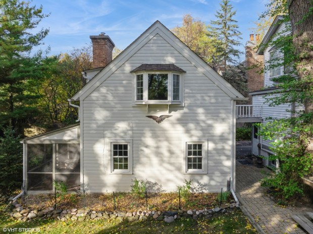 This four-bedroom Victorian house at 326 Ridge Ave. in Winnetka has a two-story coach house as well as a walk-up attic and an unfinished basement. (Petr Poliak, VHT)