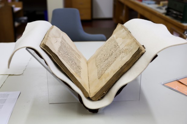 Ayer 1485, a Nahuatl-language manuscript, sits in the conservation lab at Newberry Library on the Near North Side on Dec. 11, 2024. (Eileen T. Meslar/Chicago Tribune)