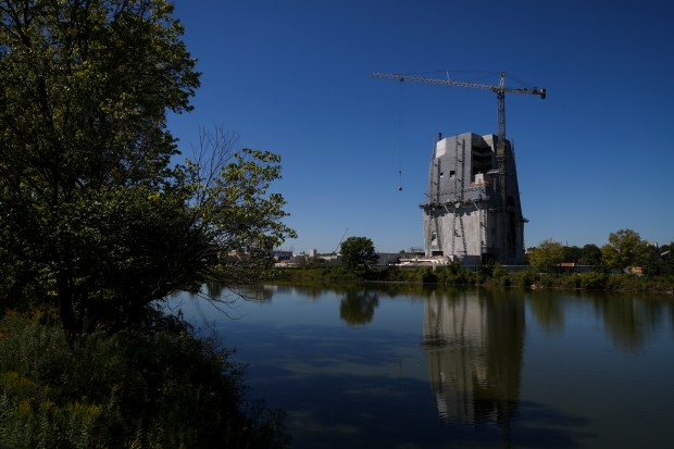 The Obama Presidential Center is reflected in the West Lagoon in Jackson Park, Sept. 4, 2024. (Eileen T. Meslar/Chicago Tribune)