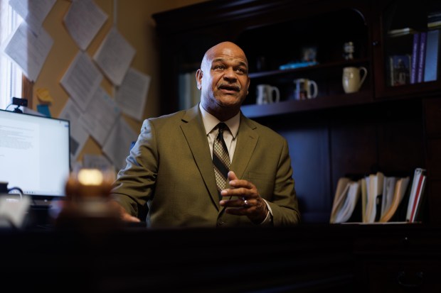 Mayor Mark Hodge, 62, sits in his office in village hall, which is located in a church, on Dec. 1, 2024, in Hopkins Park. (Armando L. Sanchez/Chicago Tribune)