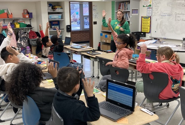 Greenwood Elementary School guest principal Dulce Ortiz talks to students about goals. (Steve Sadin/For the Lake County-News-Sun)