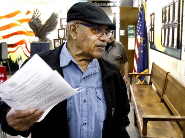 Percy Jones of Gary talks about paying his property taxes at the Lake County Government Center on Tuesday, April 4, 2023. Property tax bills are out and people are none to happy. A steady stream of taxpayers popped into the treasurer's office to pay their bills. (John Smierciak/Post-Tribune)