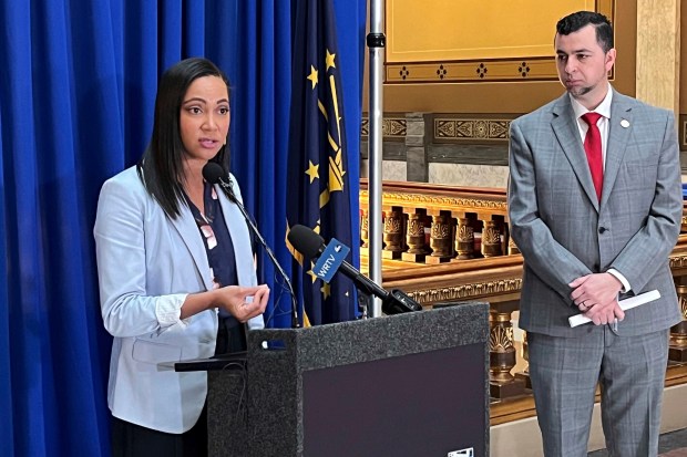 Indiana state Sen. Andrea Hunley, D-Indianapolis, speaks during a news conference alongside state Sen. Fady Qaddoura, D-Indianapolis, at the Statehouse in Indianapolis, Thursday, March 23, 2023. They and other Democratic legislators are opposing a major expansion for Indiana's private school voucher program proposed by House Republicans. (AP Photo/Tom Davies)