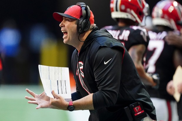 Falcons coach Arthur Smith speaks from the sideline during a game against the 49ers on Oct. 16, 2022, in Atlanta. (John Bazemore/AP)