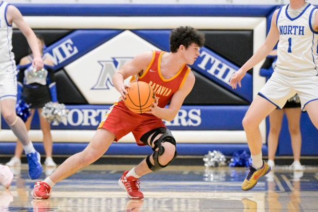 Batavia's Josh Kahley (11) moves the ball across the court against St. Charles North during a game in St. Charles on Thursday, Jan. 30, 2025. (Mark Black / for the Beacon-News)