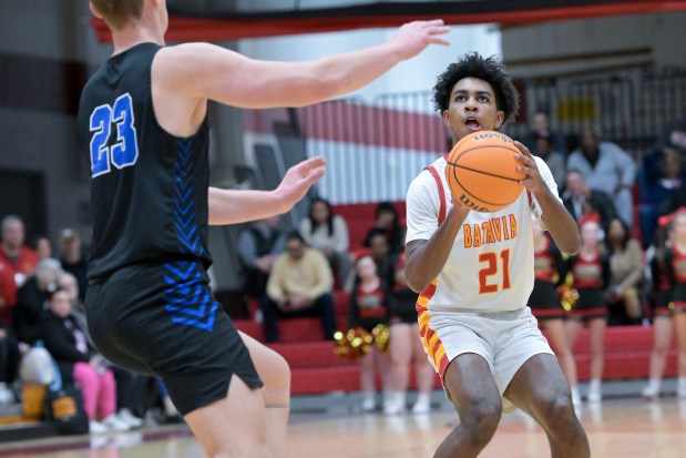 Batavia's Xavier Justice (21) takes a shot against Central during a game in Batavia on Saturday, Jan. 25, 2025. (Mark Black / for the Beacon-News)