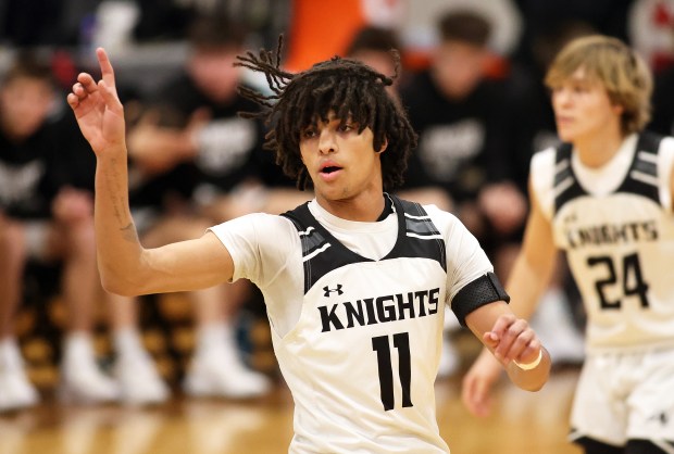 Kaneland's Evan Frieders (11) reacts to a basket in the first quarter against Hancock during a non-conference game in Maple Park on Wednesday, Jan. 8, 2025.H. Rick Bamman / For the Beacon News