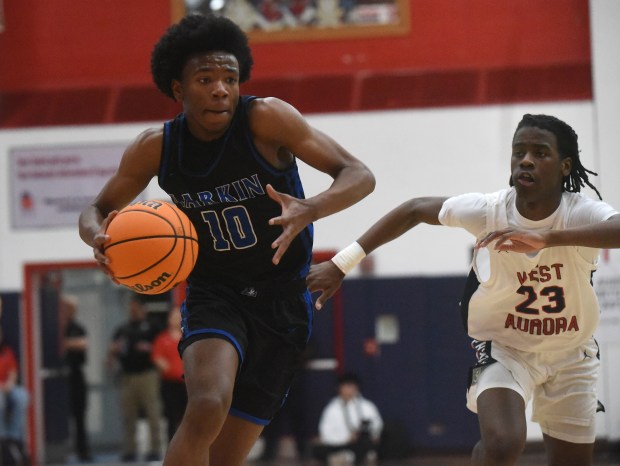 Larkin's Jahvion Sowers (10) drives to the basket against West Aurora during an Upstate Eight Conference game Thursday, Jan. 30, 2025 in Aurora, IL. (Steve Johnston/for The Beacon-News)