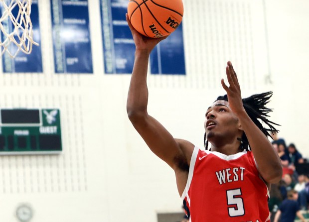 West Aurora's Terrence Smith shoots for two during the basketball game against Bartlett in Bartlett on Friday, Jan. 10, 2025. (James C. Svehla / for the Beacon-News)