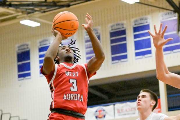 West Aurora's Jaden Edwards (3) takes a shot against Geneva during a game in Geneva on Monday, Jan. 20, 2025. (Mark Black / for the Beacon-News)