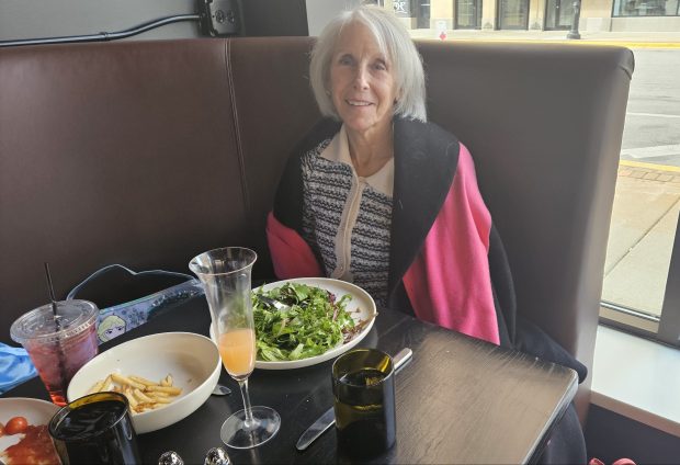 Lake Forest resident Cherie Hrusovsky enjoys lunch on Thursday at the new Arthouse restaurant in downtown Aurora. (David Sharos / For The Beacon-News)