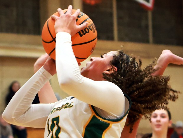 Waubonsie Valley's Danyella Mporokoso shoots two during the Coach Kipp's Hoopsfest against Hersey in Lisle on Monday, Jan. 20, 2025. (James C. Svehla / for the Beacon-News)