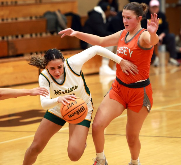 Waubonsie Valley's Danyella Mporokoso, left, charges the net during the Coach Kipp's Hoopsfest against Hersey in Lisle on Monday, Jan. 20, 2025. (James C. Svehla / for the Beacon-News)