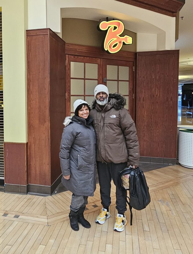 Curtiss and Schlise Browley stand in front of Banana Pudding, their business at Fox Valley Mall in Aurora, on Friday morning. (David Sharos / For The Beacon-News)