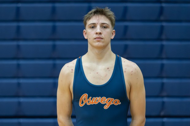 Oswego's Brayden Swanson stands for a photo after winning a by forfeit against Oswego East during a wrestling match in Oswego on Tuesday, Jan. 16, 2025. (Troy Stolt / for the Daily Southtown)