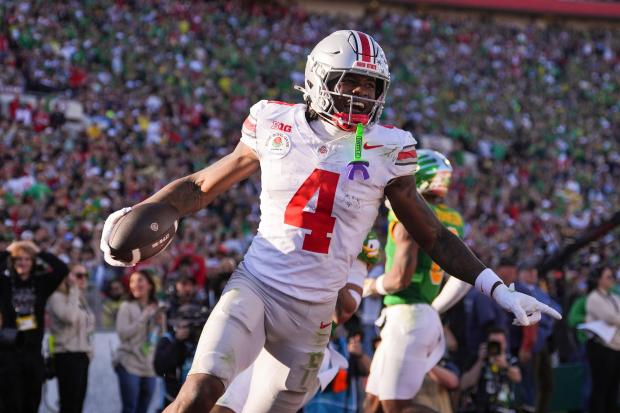 Ohio State wide receiver Jeremiah Smith celebrates his touchdown against Oregon during the Rose Bowl on Jan. 1, 2025, in Pasadena, Calif. (AP Photo/Mark J. Terrill)