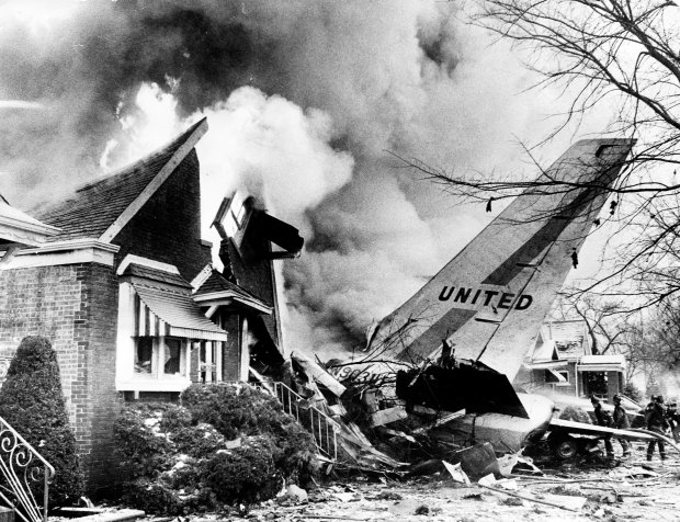 A United Airlines 737 crashed into a house near Midway Airport on Dec. 8, 1972, killing 45 people, including two people in the house. (Don Casper/Chicago Tribune)