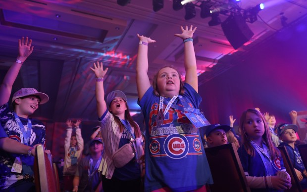 Young Cubs fans cheer for Cubs mascot Clark before the opening ceremony of the Cubs Convention at the Sheraton Grand Chicago Riverwalk on Jan. 17, 2025. (John J. Kim/Chicago Tribune)