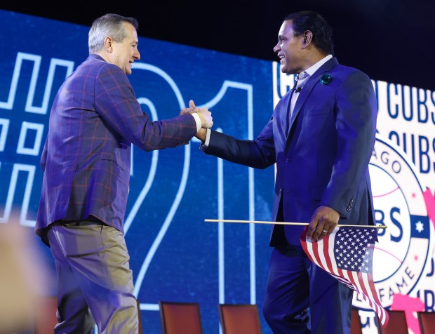 Cubs chairman Tom Ricketts, left, and former slugger Sammy Sosa greet during the opening ceremony of the Cubs Convention at the Sheraton Grand Chicago Riverwalk on Jan. 17, 2025. (John J. Kim/Chicago Tribune)