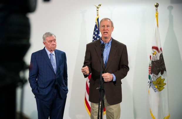 Former Gov. Bruce Rauner holds news conference with former DCFS Director George Sheldon in Chicago, March 21, 2016, announcing an ambitious effort to repair Illinois' beleaguered child welfare system. (Zbigniew Bzdak/Chicago Tribune)