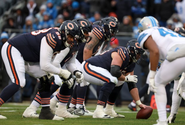 Chicago Bears center Coleman Shelton (65) and the offensive line prepare to snap the ball against the Detroit Lions in the fourth quarter Sunday, Dec. 22, 2024, at Soldier Field. (Brian Cassella/Chicago Tribune)