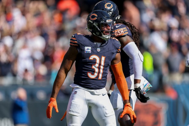 Bears safety Kevin Byard celebrates after getting an interception during the third quarter against the Panthers at Soldier Field on Oct. 6, 2024. (Armando L. Sanchez/Chicago Tribune)