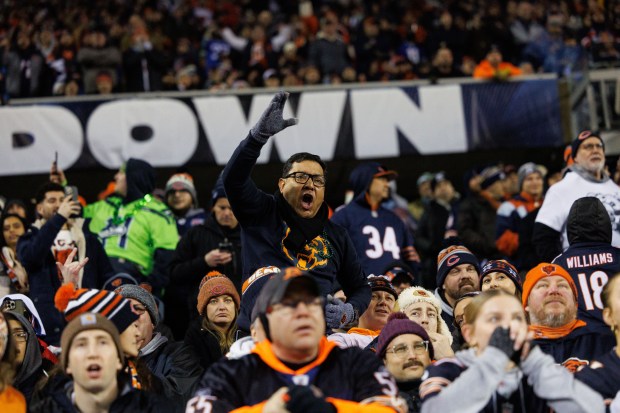 Bears fans yell in the final minutes of the fourth quarter against the Seahawks on Dec. 26, 2024, at Soldier Field. (Armando L. Sanchez/Chicago Tribune)