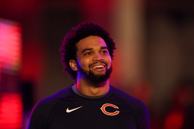 Bears quarterback Caleb Williams walks onto the field before the game against the Seahawks at Soldier Field on Dec. 26, 2024. (Eileen T. Meslar/Chicago Tribune)