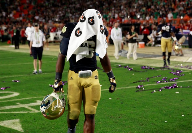 Notre Dame running back Theo Riddick leaves the field after a loss to Alabama in the BCS championship game on Jan. 7, 2013, in Miami Gardens, Fla. (Nuccio DiNuzzo/Chicago Tribune)