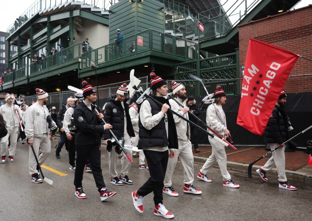 Blackhawks players arrive for the NHL Winter Classic against the Blues at Wrigley Field on Dec. 31, 2024. (John J. Kim/Chicago Tribune)