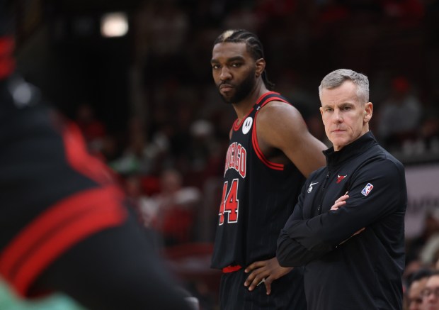 Bulls head coach Billy Donovan and forward Patrick Williams (44) watch the third quarter against the Hornets at the United Center on Dec. 13, 2024, in Chicago. (John J. Kim/Chicago Tribune)