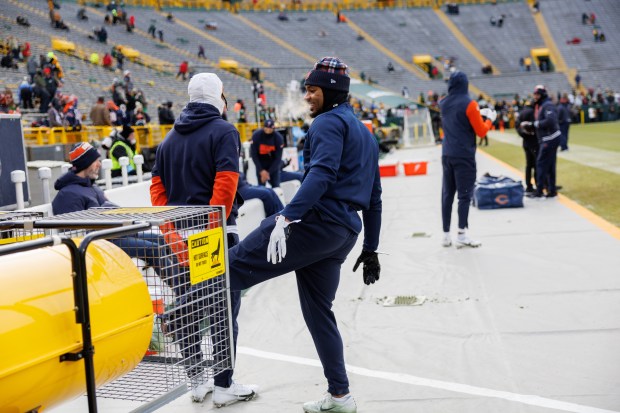 Chicago Bears safety Jonathan Owens warms up near the bench before the Bears play the Green Bay Packers. (Armando L. Sanchez/Chicago Tribune)