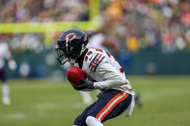 Chicago Bears cornerback Josh Blackwell (39) catches the ball before running in a punt return for a touchdown during the first quarter against the Green Bay Packers at Lambeau Field Sunday Jan. 5, 2025, in Green Bay, Wis. (Armando L. Sanchez/Chicago Tribune)