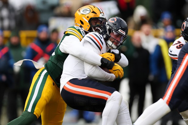 Packers defensive end Rashan Gary sacks Bears quarterback Caleb Williams on Jan. 5, 2025, at Lambeau Field in Green Bay. (Armando L. Sanchez/Chicago Tribune)