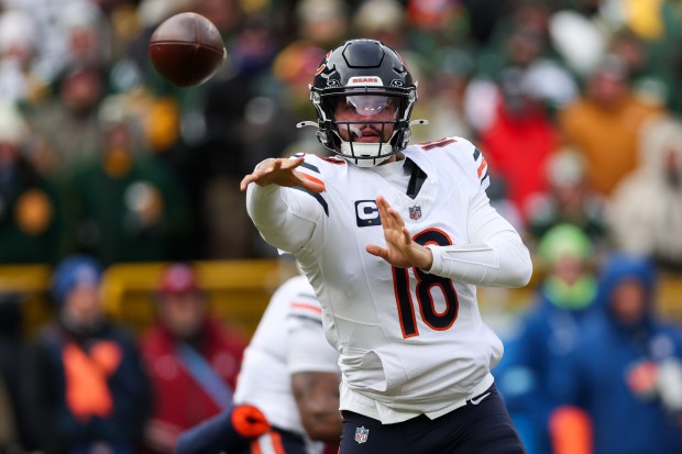 Bears quarterback Caleb Williams throws a pass during the first quarter against the Packers at Lambeau Field on Jan. 5, 2025, in Green Bay. (Armando L. Sanchez/Chicago Tribune)