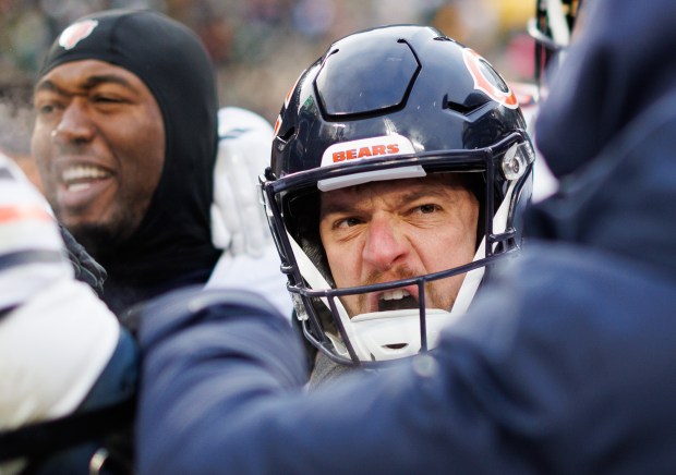 Chicago Bears place kicker Cairo Santos (8) celebrates on the field with other players after kicking the game winning field goal to give the Bears a 24-22 win over the Green Bay Packers at Lambeau Field on Jan. 5, 2025, in Green Bay, Wisconsin. (Armando L. Sanchez/Chicago Tribune)