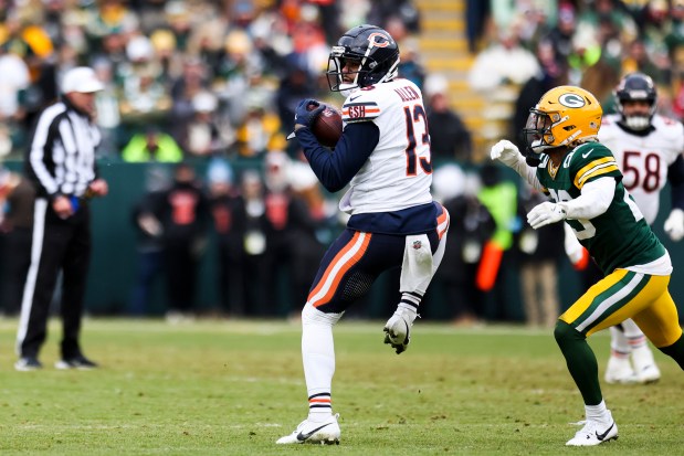 Chicago Bears wide receiver Keenan Allen (13) catches a pass during the second quarter against the Green Bay Packers at Lambeau Field in Green Bay, Wis., on Sunday, Jan. 5, 2025. (Eileen T. Meslar/Chicago Tribune)